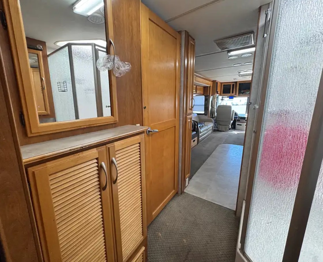 2005 Fleetwood Discovery 39L — shower enclosure and linen cabinet